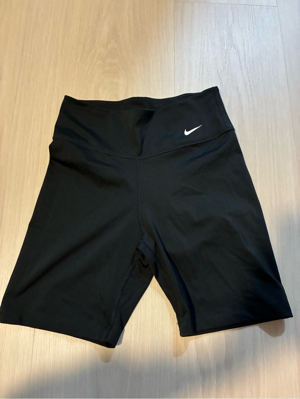 Nike Women's Black High-Rise Bike Shorts with White Swoosh